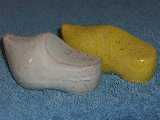 Dutch shoe shakers glazed white sand and sunflower yellow